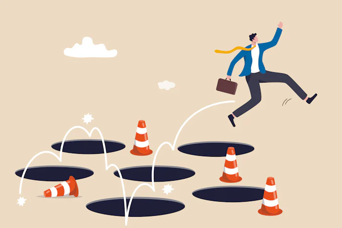 Illustration of a businessman leaping over deep holes and safety cones, representing avoidance of growth leadership pitfalls. 